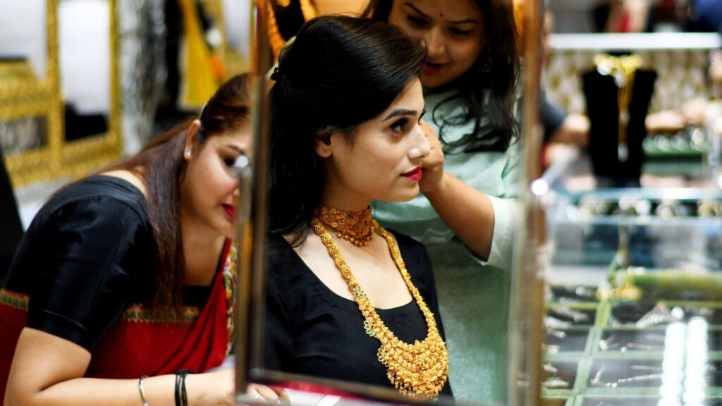 Gold price dips  ₹3300 from all-time high. Should you buy in this correction?