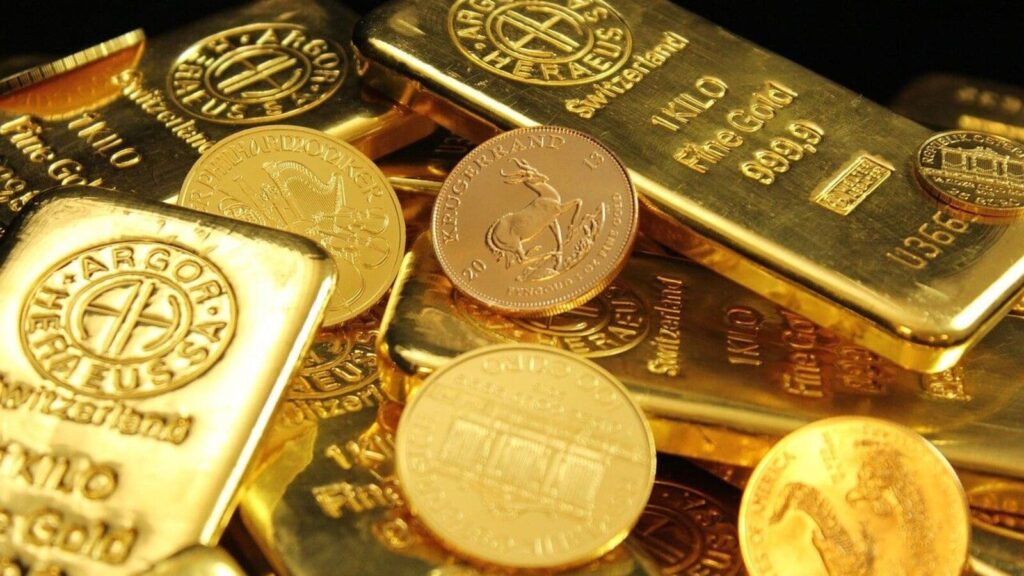 Gold falls over 1% as investors take profits, attention shifts to US data; silver plunges 5% | Stock Market News